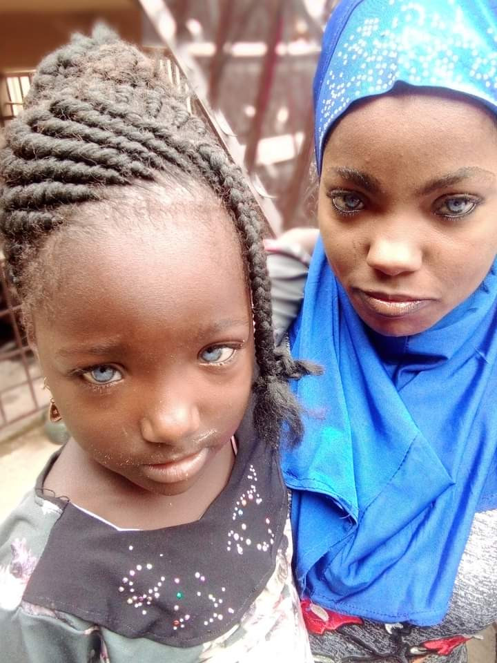 Kwara native reportedly rejects daughters due to their blue eyes
