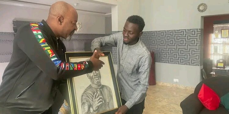 Yahaya Kwande received a Christmas gift of a portrait from Reshini