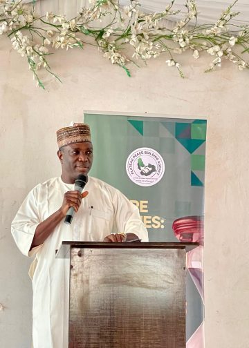 Deputy Governor Ngo Piyo Unveils PSPBA 10th Anniversary Logo at Peace Forum in Plateau